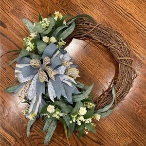 Blue Floral Grapevine Holiday Wreath with Bow